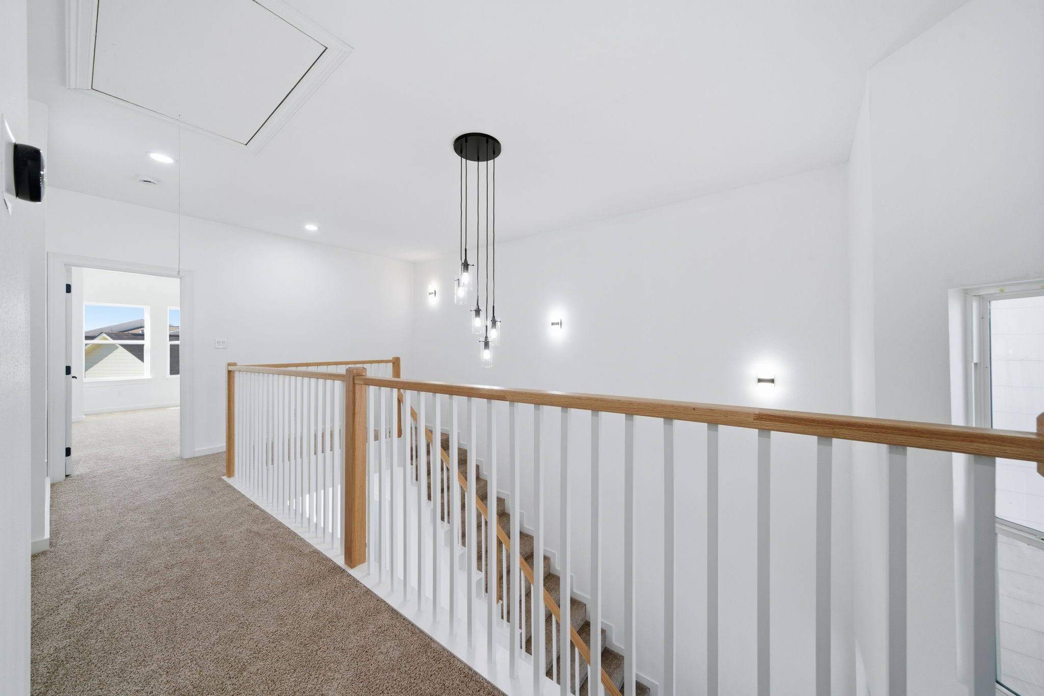 111 Capetown Way Conroe, TX 77356 - Photo 18 of 37 a view of a hallway with stairs