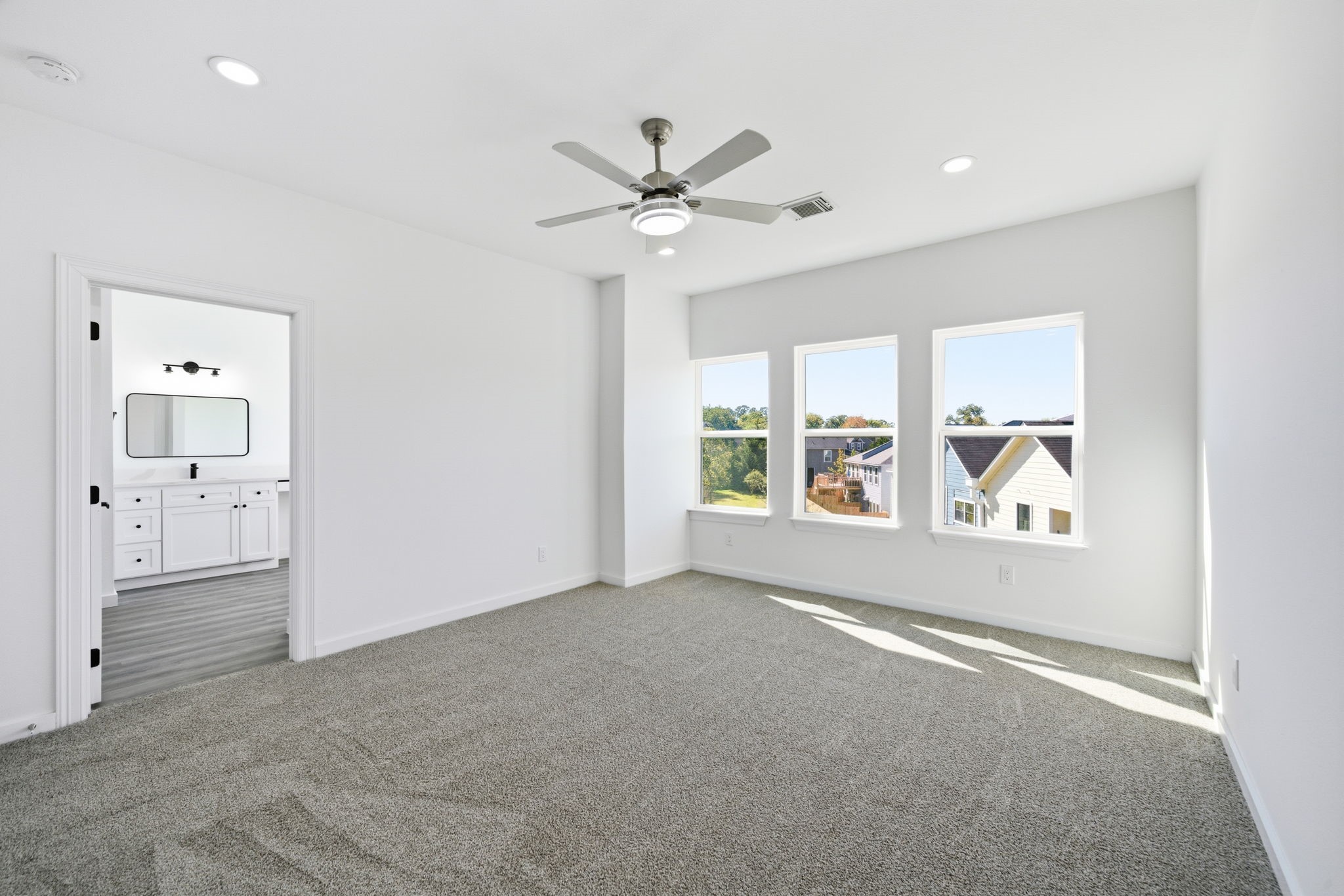 111 Capetown Way Conroe, TX 77356 - Photo 23 of 37 a view of an empty room with a window