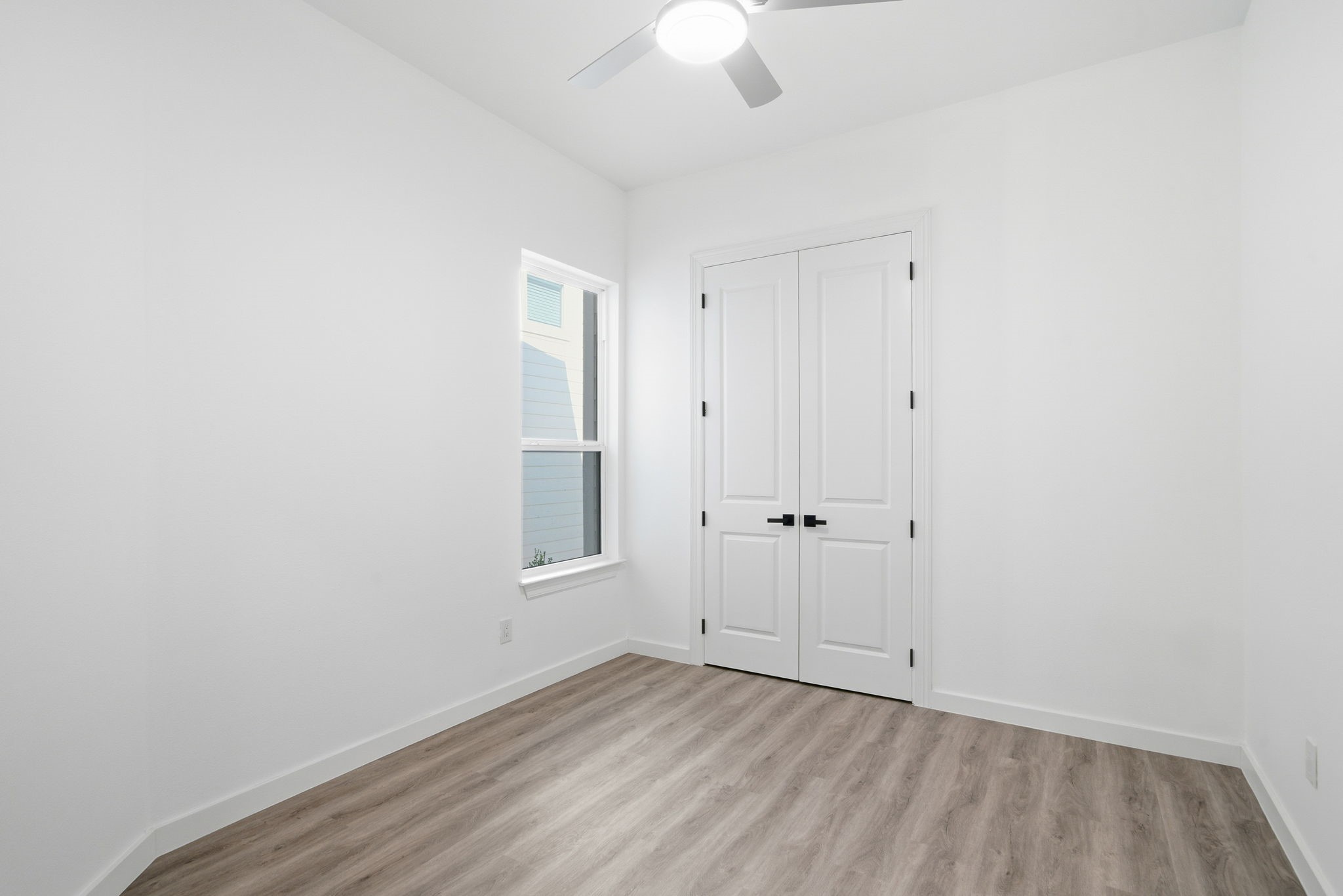 111 Capetown Way Conroe, TX 77356 - Photo 24 of 37 a view of an empty room with a window