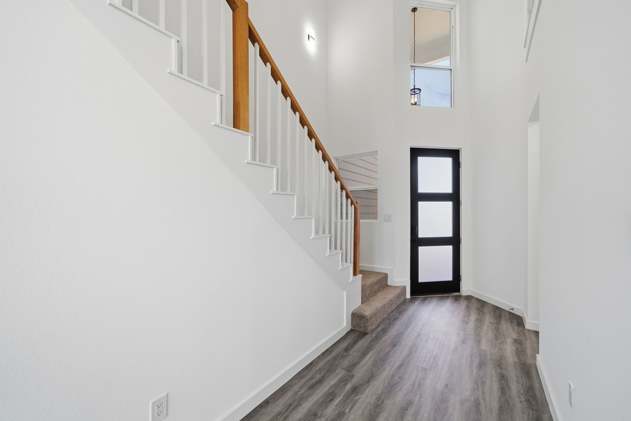 111 Capetown Way Conroe, TX 77356 - Photo 6 of 37 a view of entryway with wooden floor
