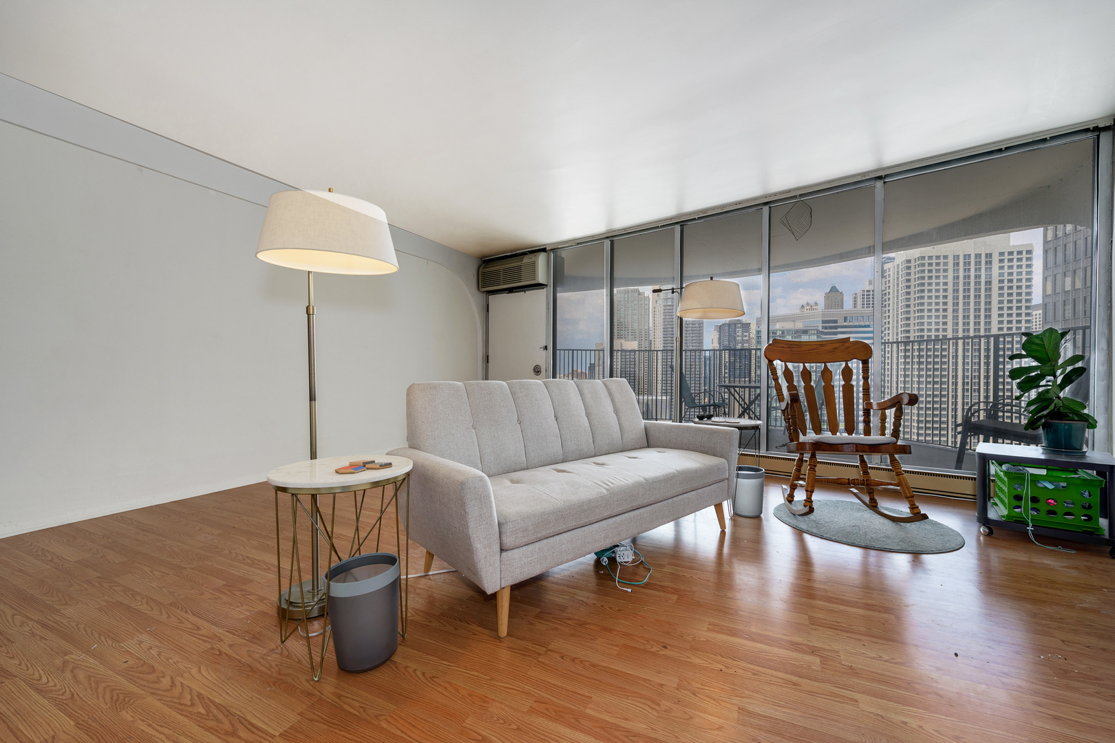 300 North State Street, Unit 3129 Chicago, IL 60654 - Photo 3 of 19 a living room with furniture and a table