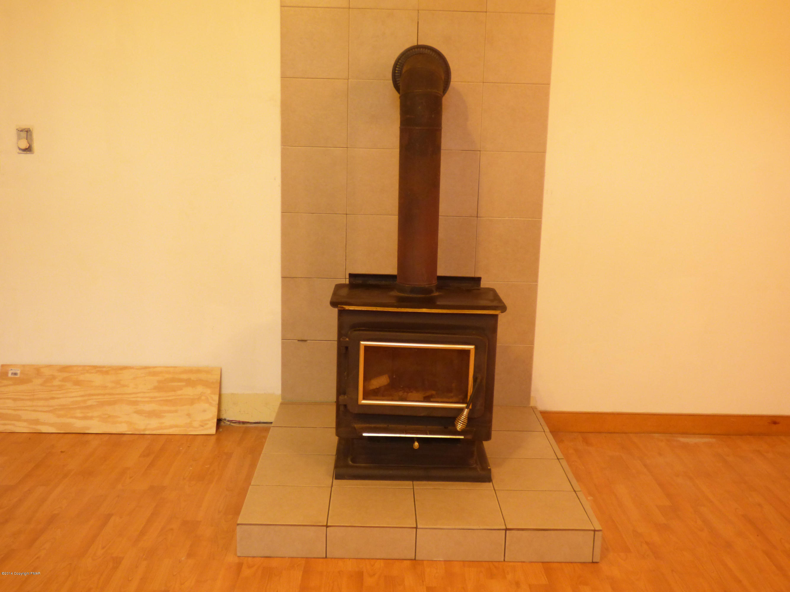 6568 Cone Road East Stroudsburg, PA 18302 - Photo 6 of 13 wood stove