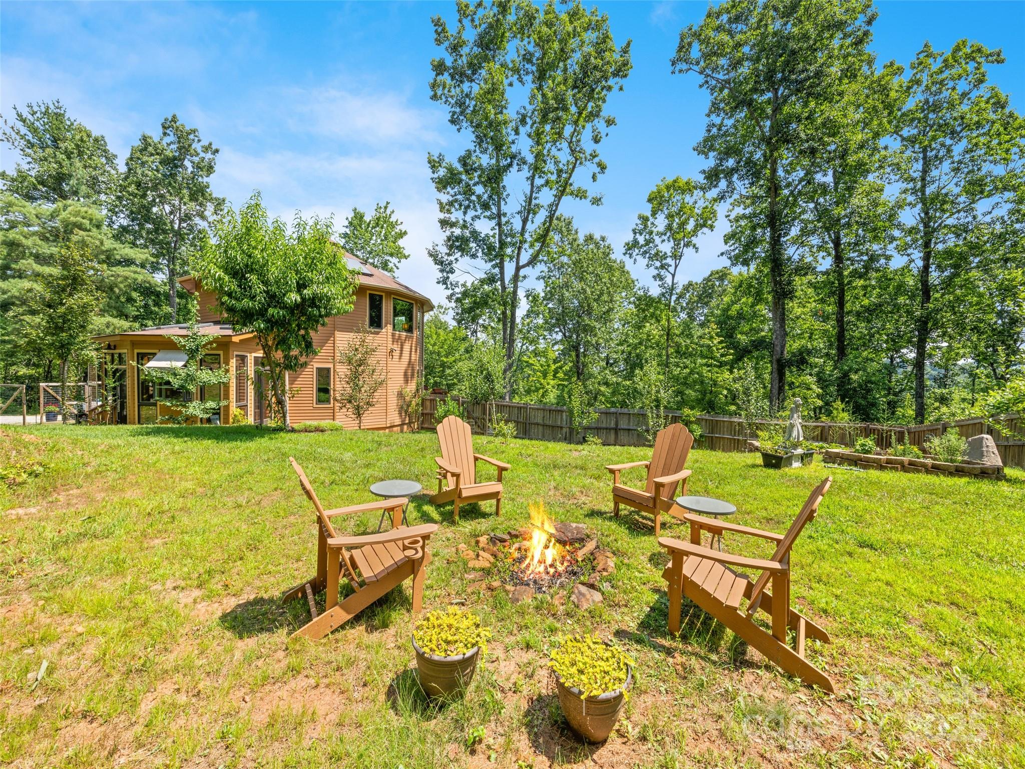 2675 Holbert Cove Road Saluda, NC 28773 - Photo 13 of 48 a view of a swimming pool with a patio