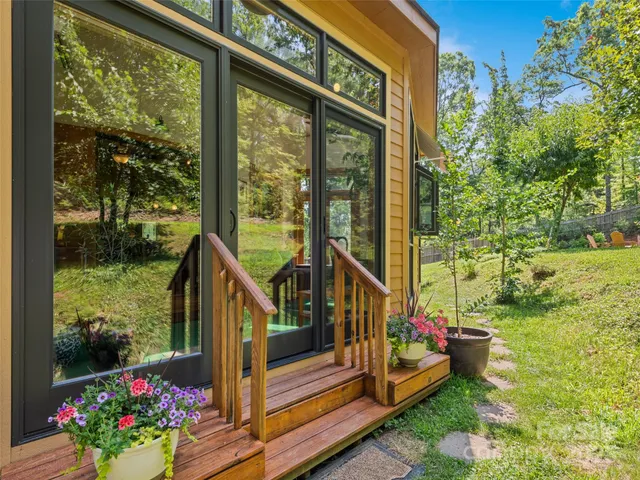 a view of sitting area in front of house