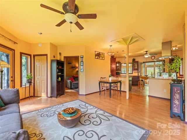 a living room with patio area and a table