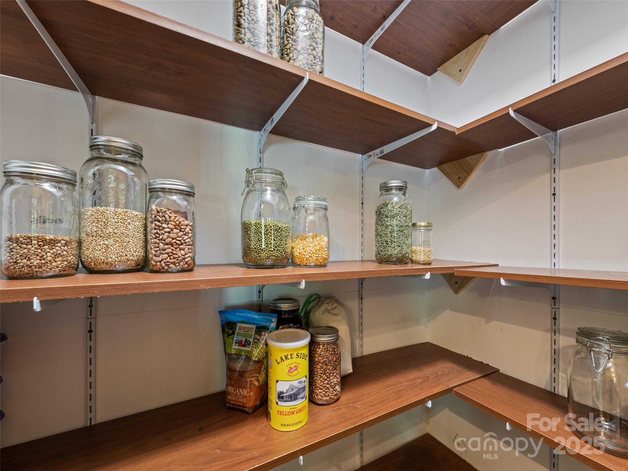 2675 Holbert Cove Road Saluda, NC 28773 - Photo 26 of 48 a room with wooden floor and window