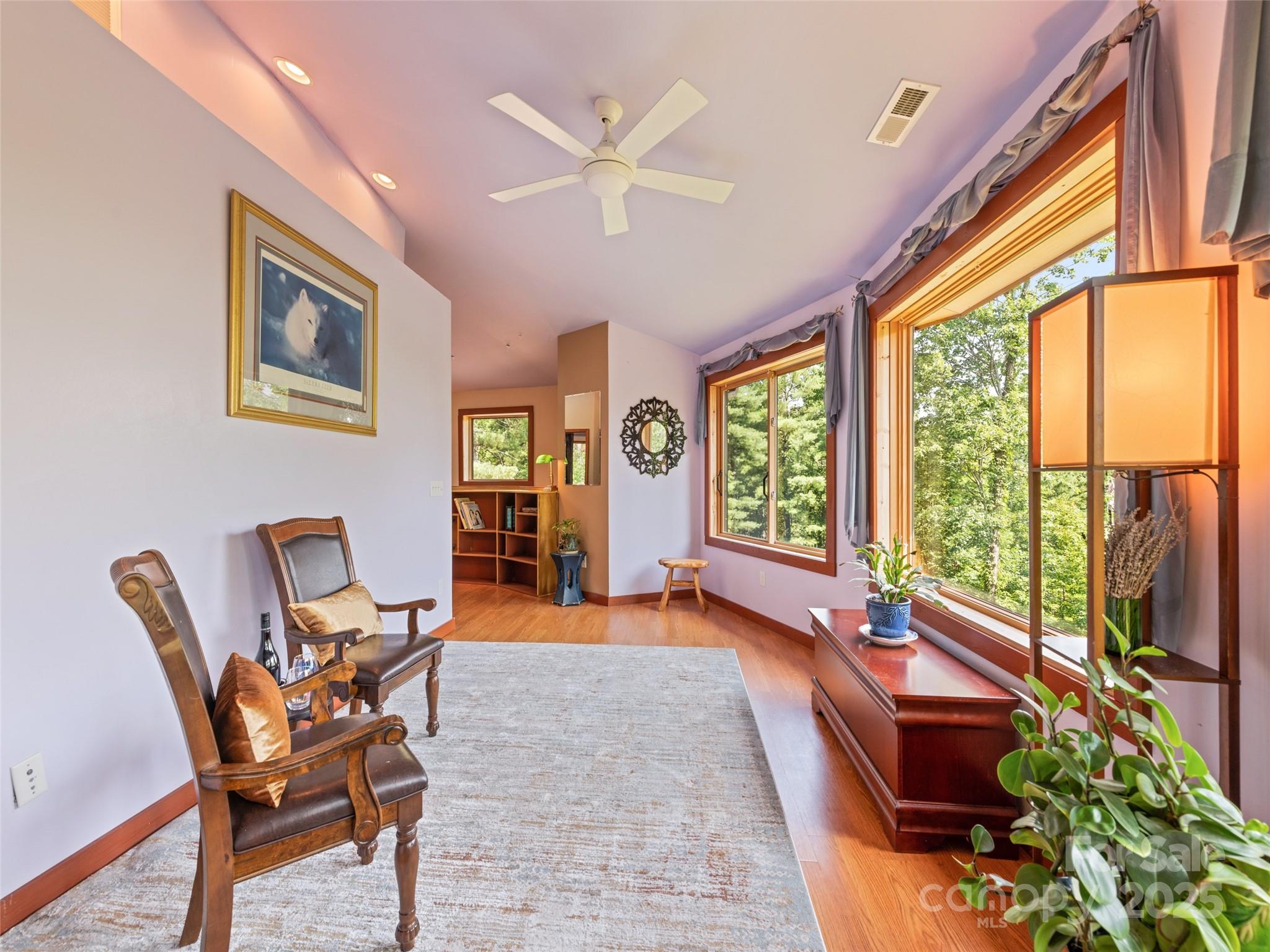 2675 Holbert Cove Road Saluda, NC 28773 - Photo 31 of 48 a living room with furniture and a flat screen tv
