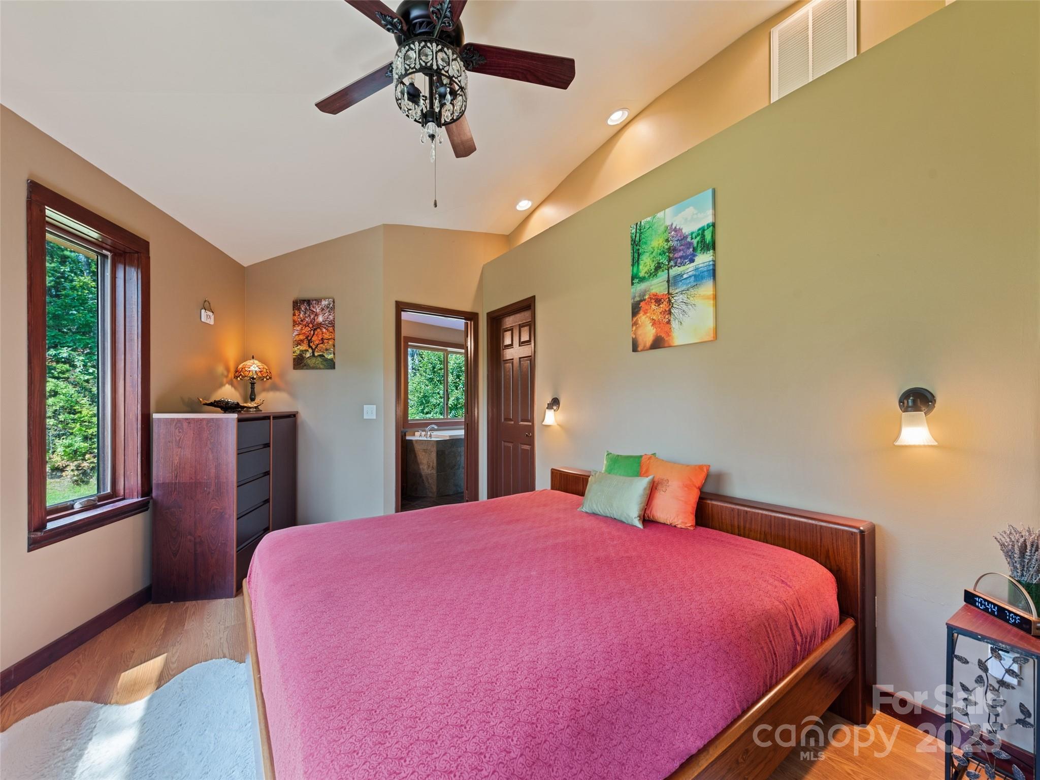 2675 Holbert Cove Road Saluda, NC 28773 - Photo 37 of 48 a bed room with a bed and a large window