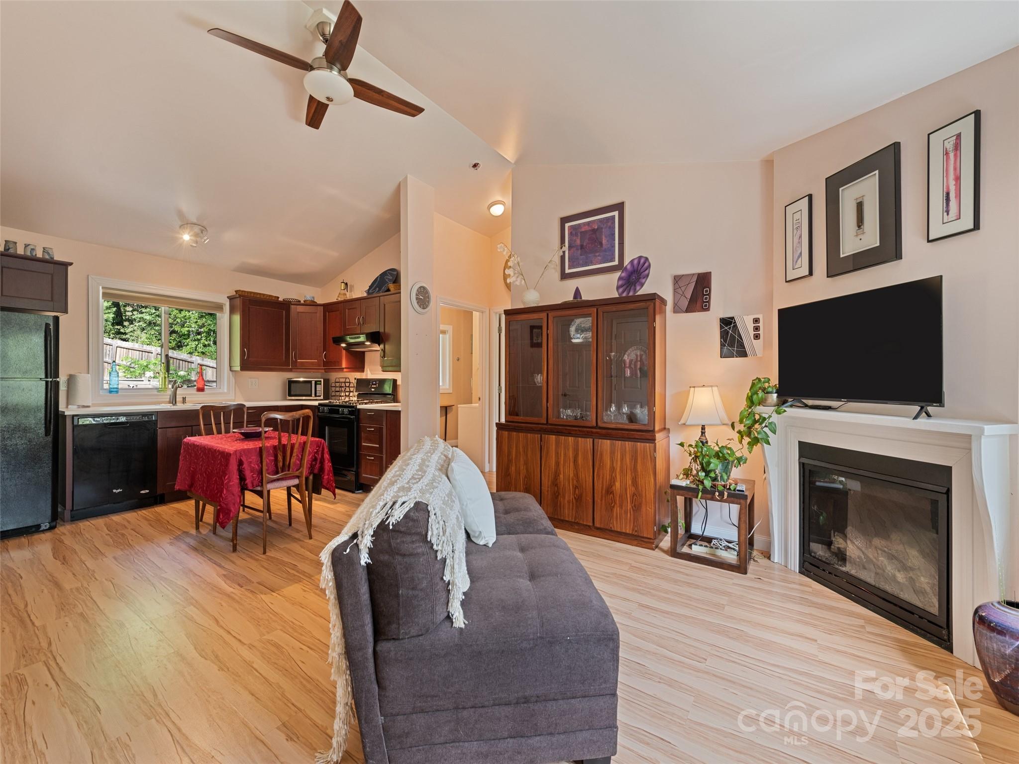 2675 Holbert Cove Road Saluda, NC 28773 - Photo 42 of 48 a living room with furniture and a flat screen tv