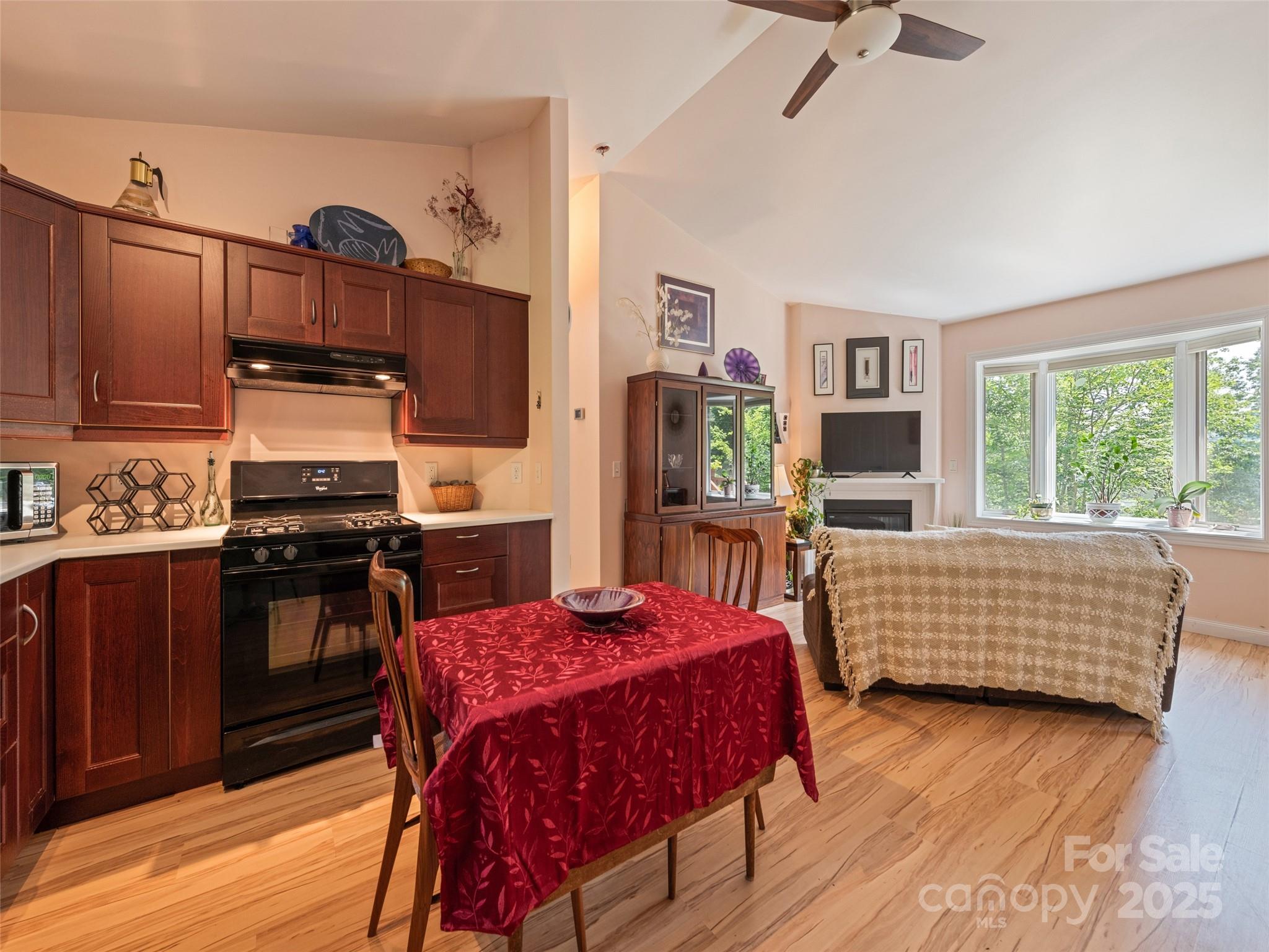2675 Holbert Cove Road Saluda, NC 28773 - Photo 44 of 48 a bedroom with a bed and furniture