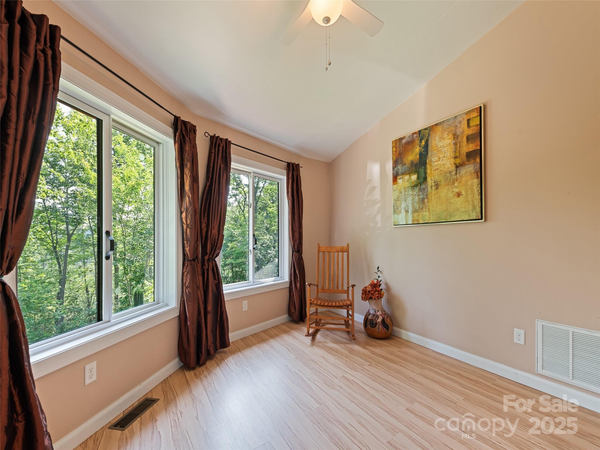 2675 Holbert Cove Road Saluda, NC 28773 - Photo 46 of 48 a view of a room with gym equipment and a large window
