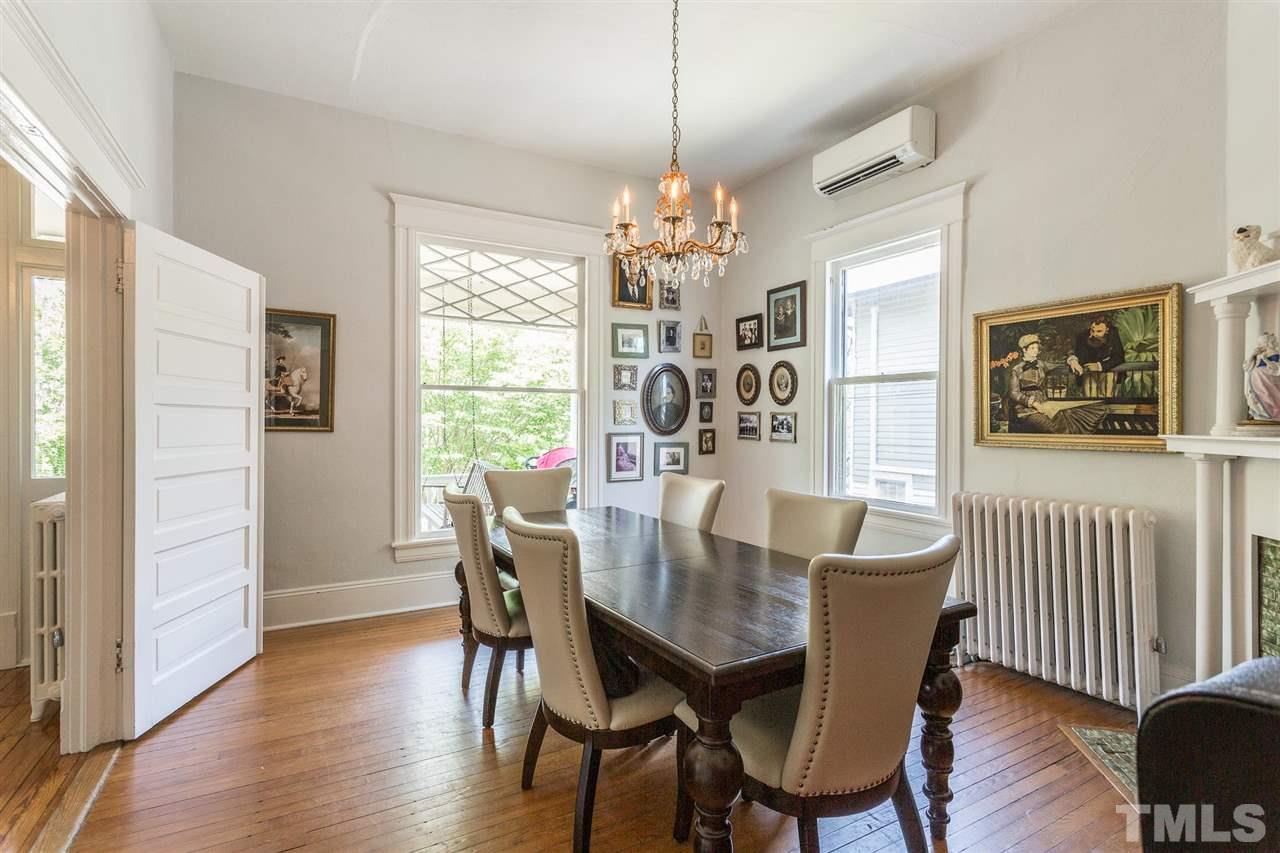 220 North East Street Raleigh, NC 27601 - Photo 14 of 30 a view of a dining room with furniture window and wooden floor