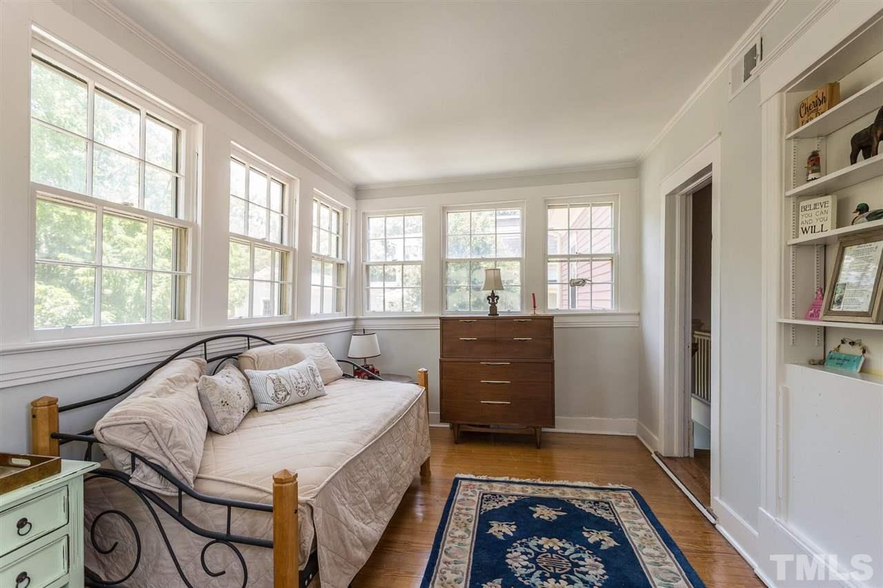 220 North East Street Raleigh, NC 27601 - Photo 23 of 30 a bedroom with furniture and a rug