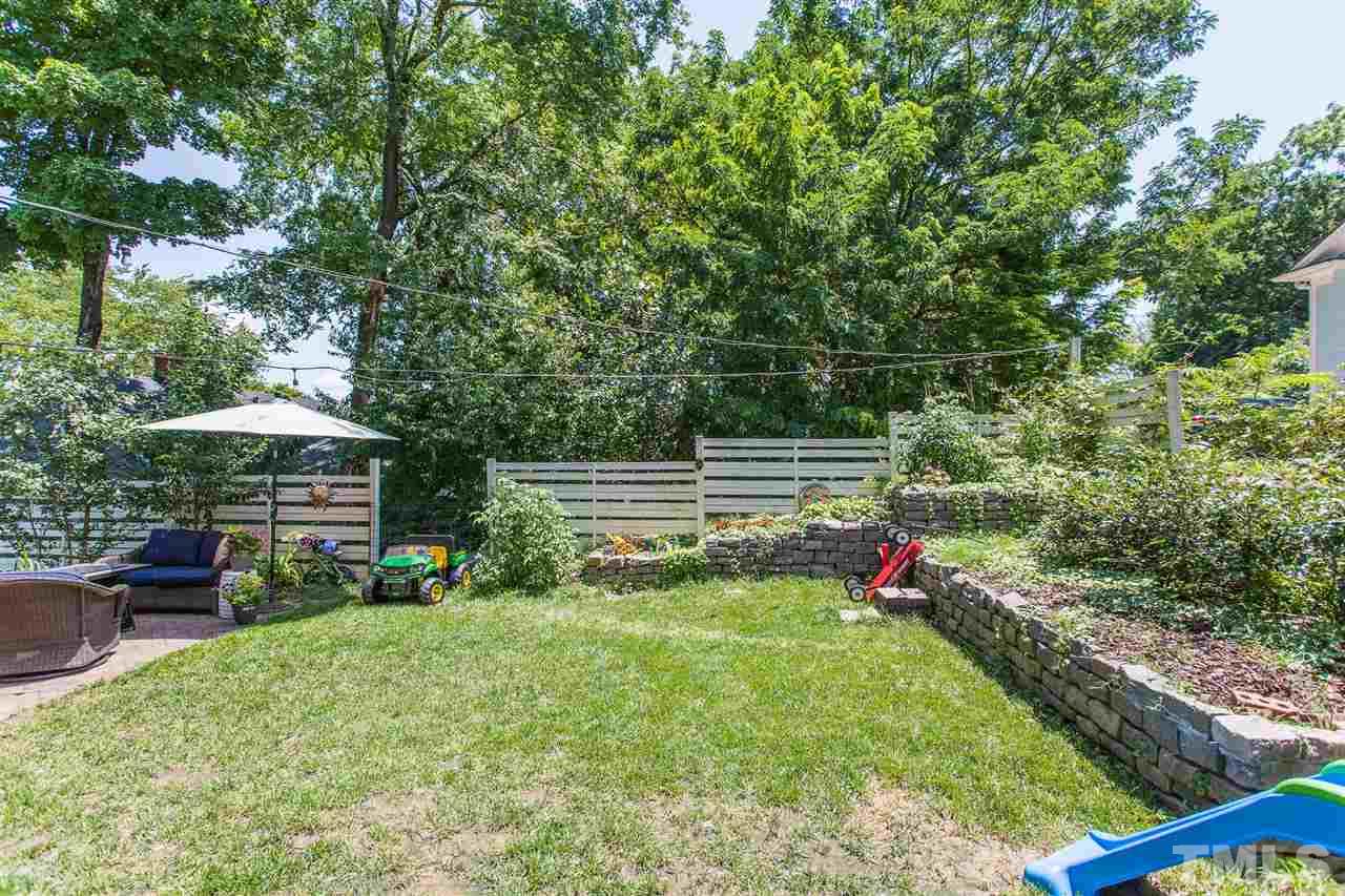 220 North East Street Raleigh, NC 27601 - Photo 7 of 30 a view of a garden with an outdoor seating