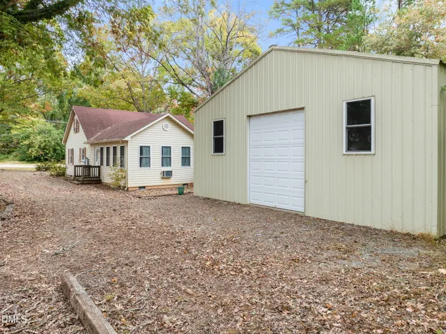 a house with trees in the background
