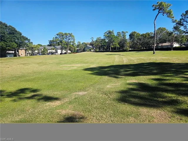 a view of a park with a slide