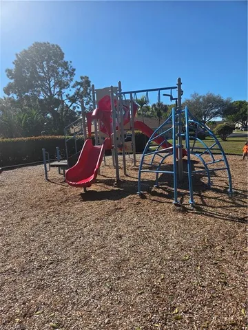 a view of a swimming pool with a porch
