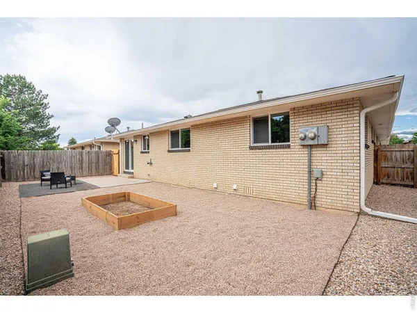 a house view with a backyard space