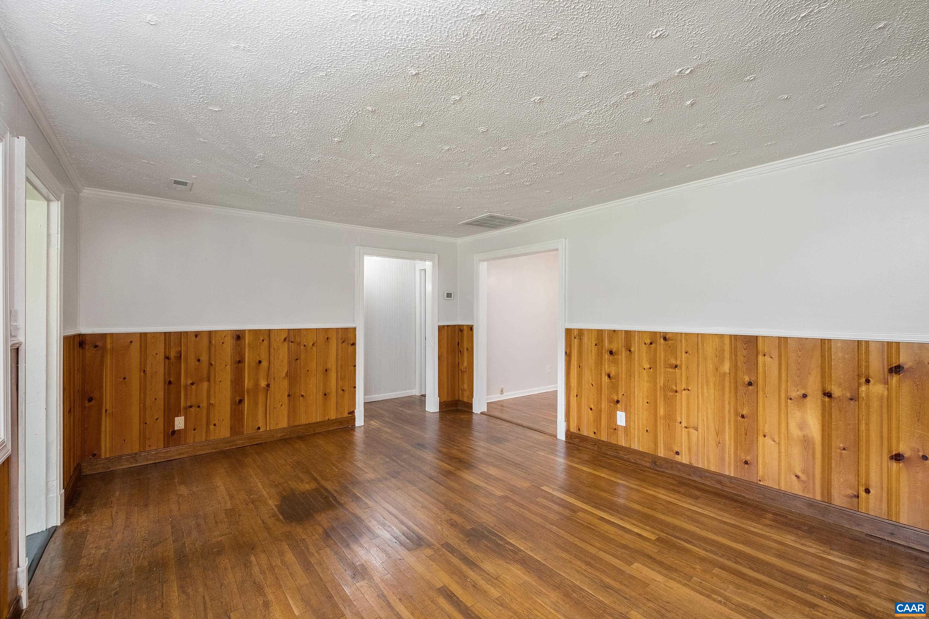 578 Maxfield Road Keswick, VA 22947 - Photo 15 of 39 a view of an empty room with wooden floor