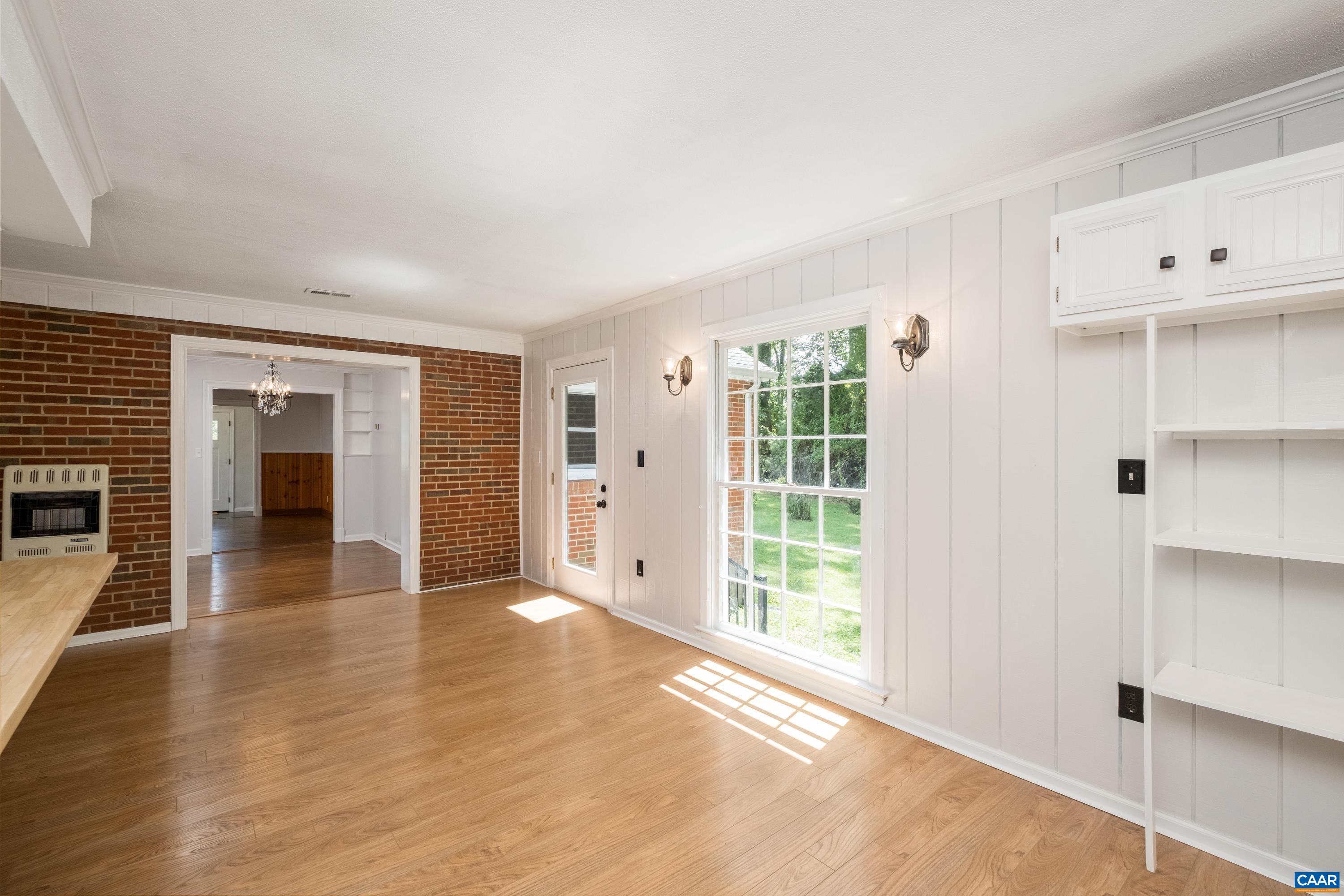578 Maxfield Road Keswick, VA 22947 - Photo 16 of 39 a view of an empty room with wooden floor and a window