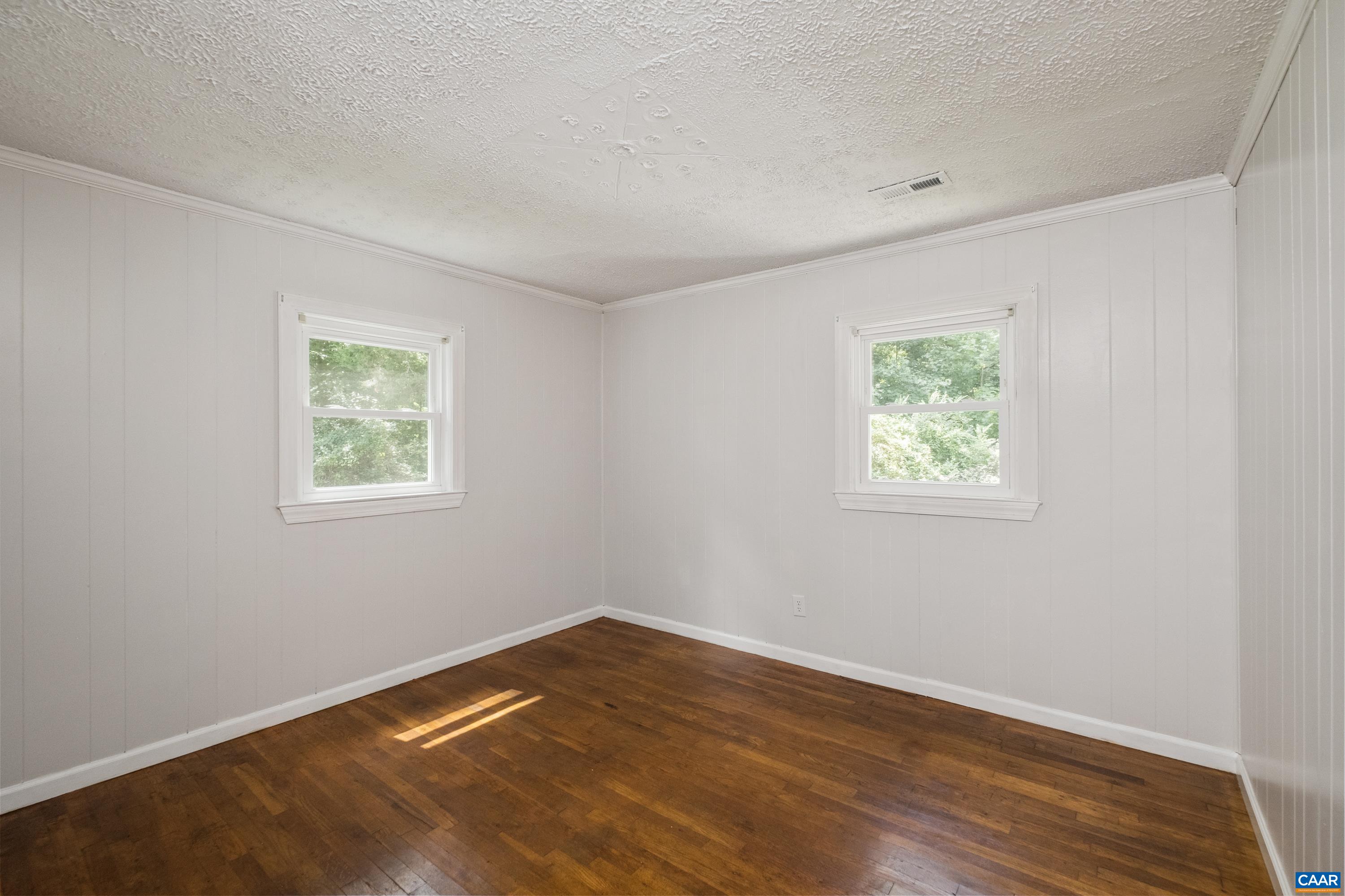 578 Maxfield Road Keswick, VA 22947 - Photo 17 of 39 an empty room with a window