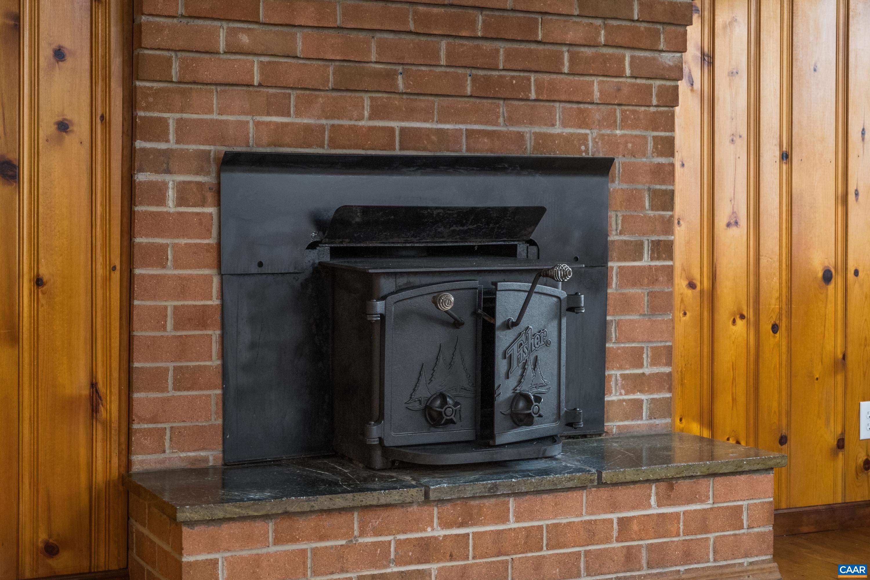 578 Maxfield Road Keswick, VA 22947 - Photo 27 of 39 a close view of a fireplace