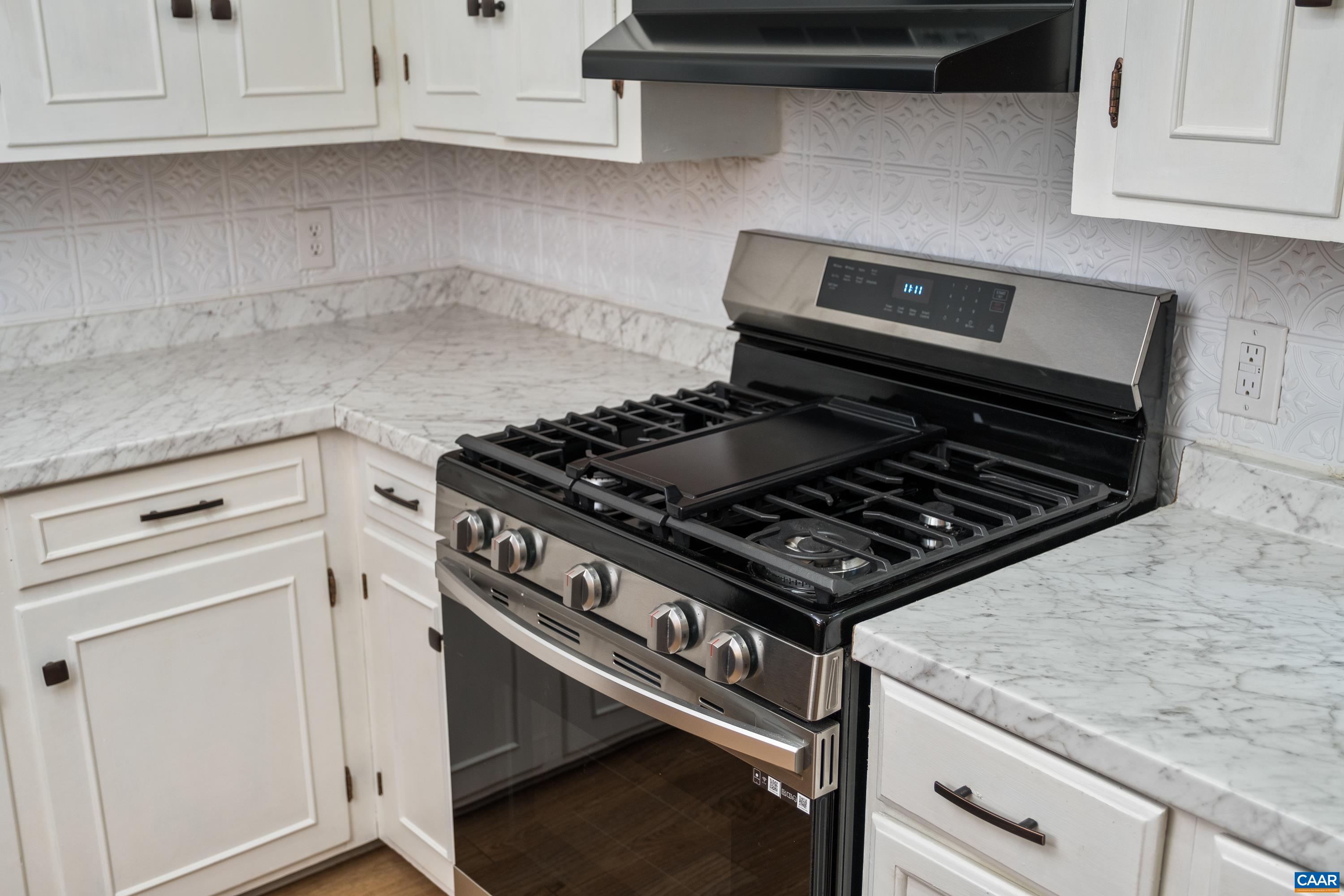 578 Maxfield Road Keswick, VA 22947 - Photo 29 of 39 a stove top oven sitting inside of a kitchen