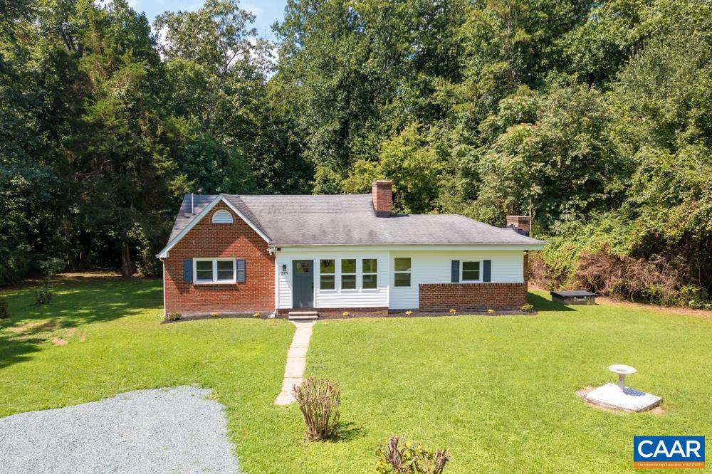 578 Maxfield Road Keswick, VA 22947 - Photo 30 of 39 a front view of a house with a yard