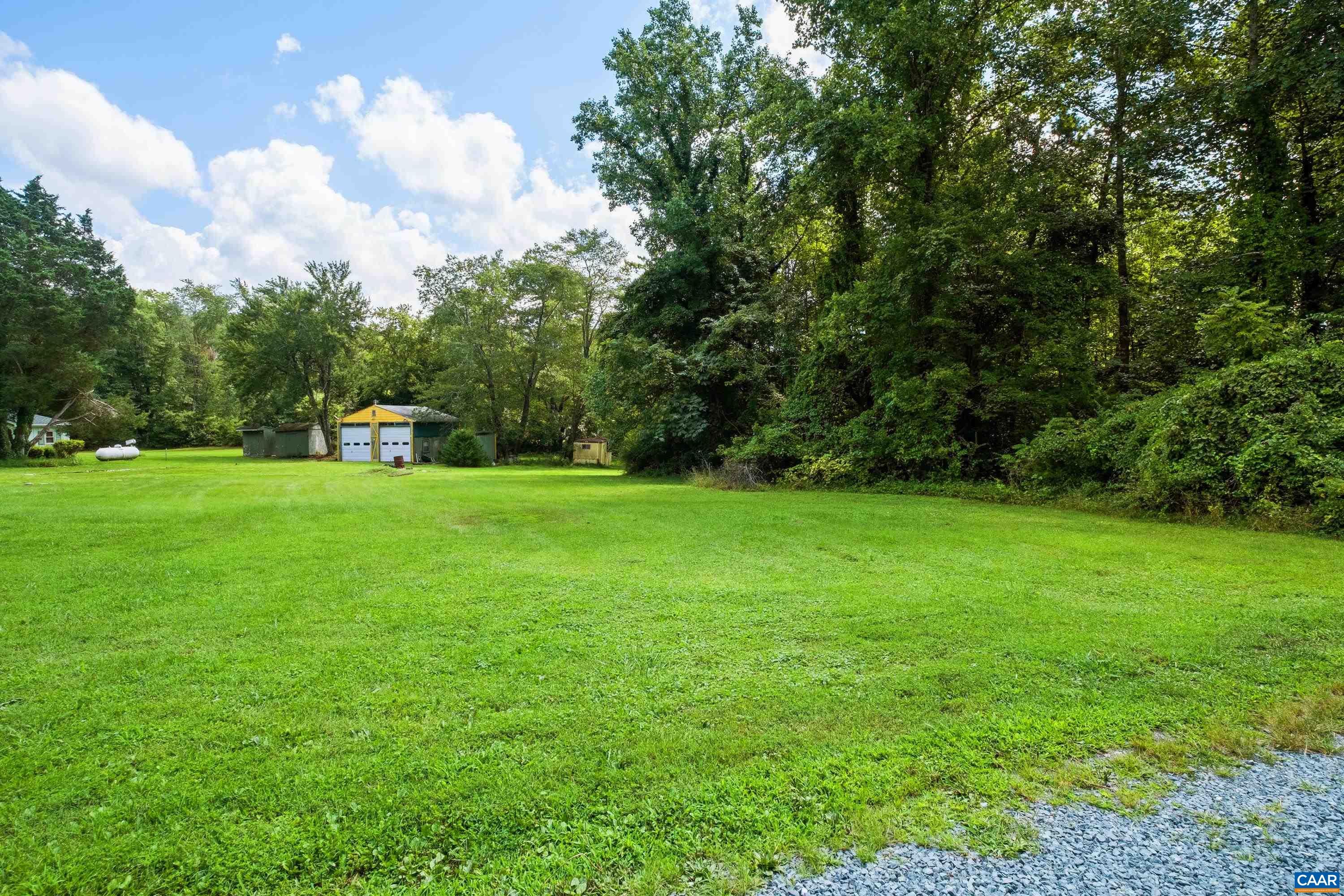 578 Maxfield Road Keswick, VA 22947 - Photo 7 of 39 a view of a garden and basketball court