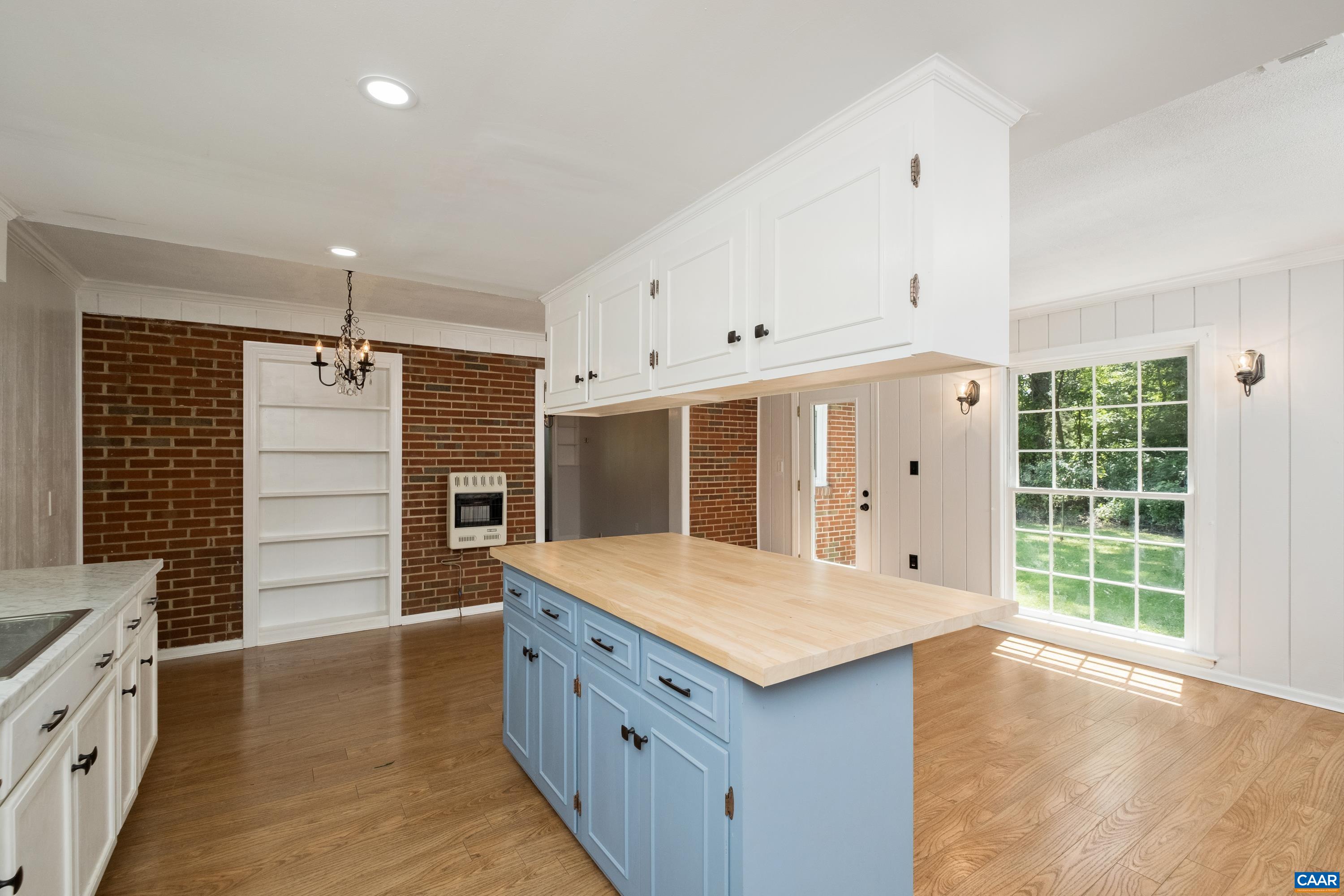 578 Maxfield Road Keswick, VA 22947 - Photo 10 of 39 an open kitchen with a sink and windows