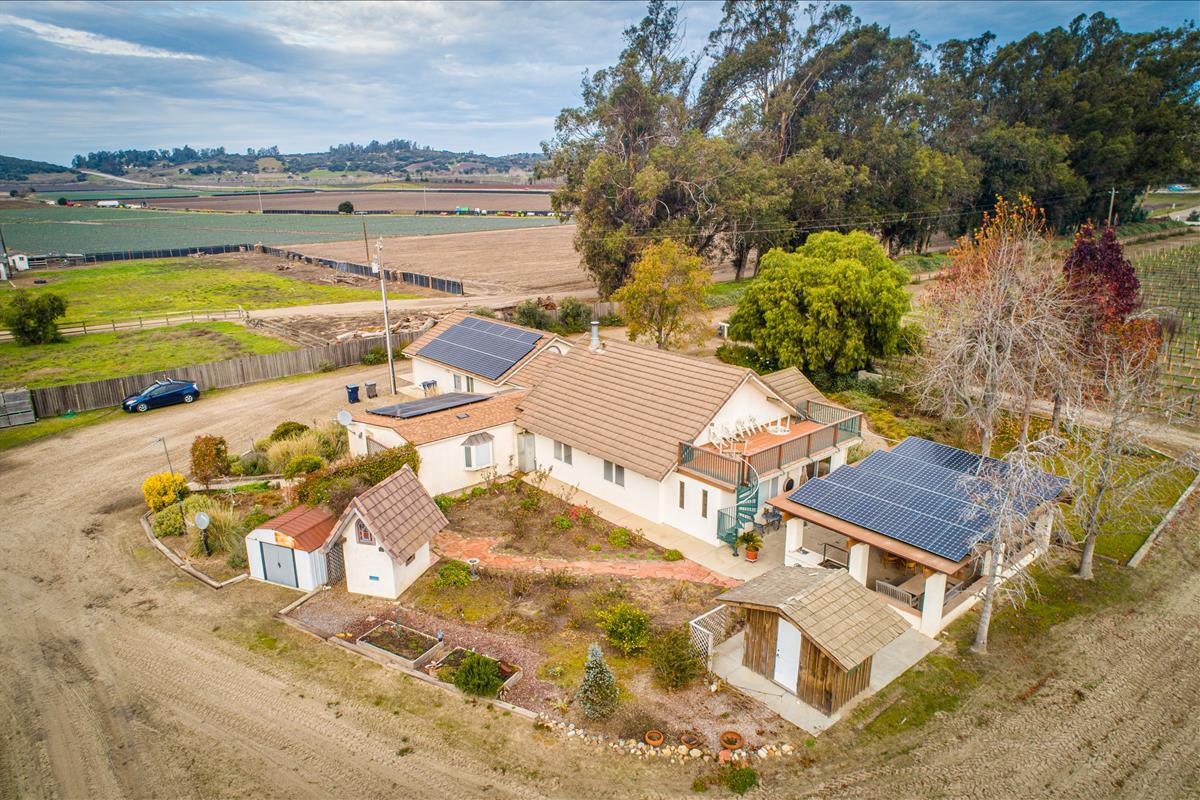 4892 Hapgood Road Lompoc, CA 93436 - Photo 6 of 32 an aerial view of a house with garden space and ocean view