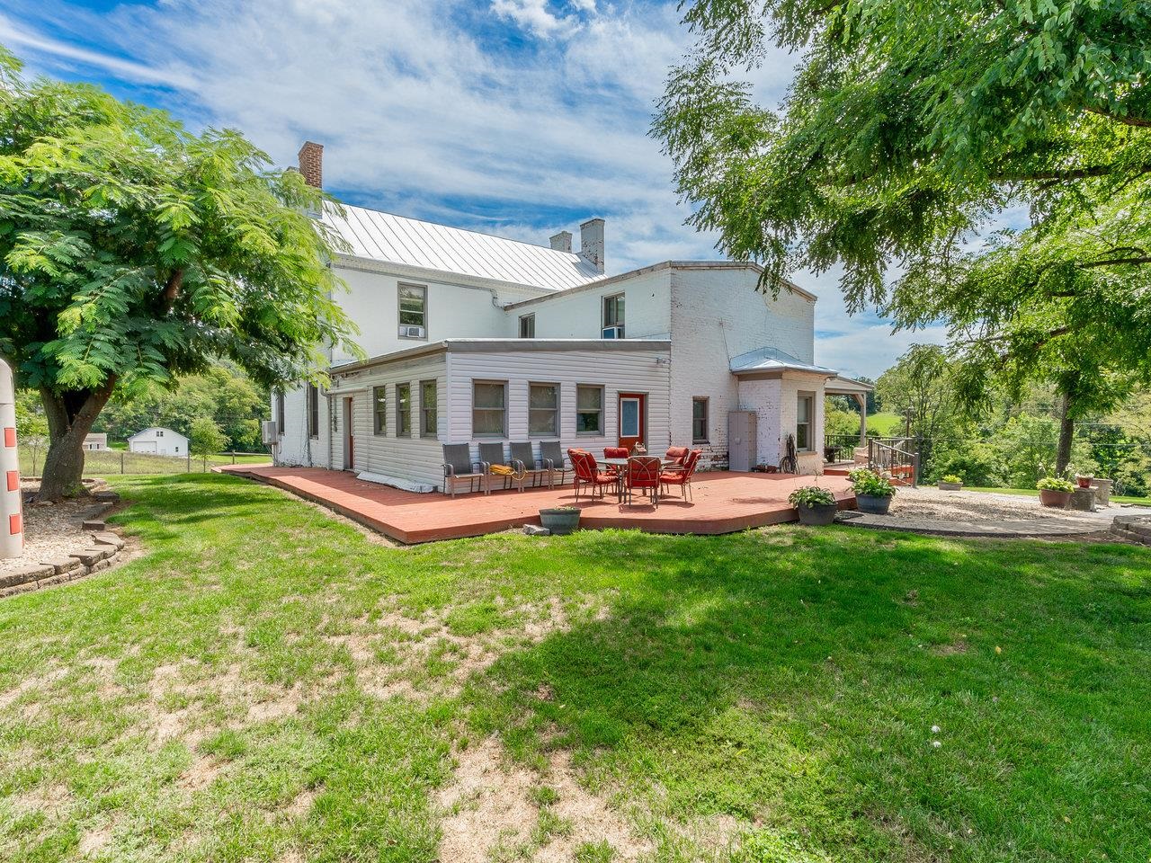 1299 North River Road Mount Crawford, VA 22841 - Photo 11 of 75 a view of a house with swimming pool and a yard