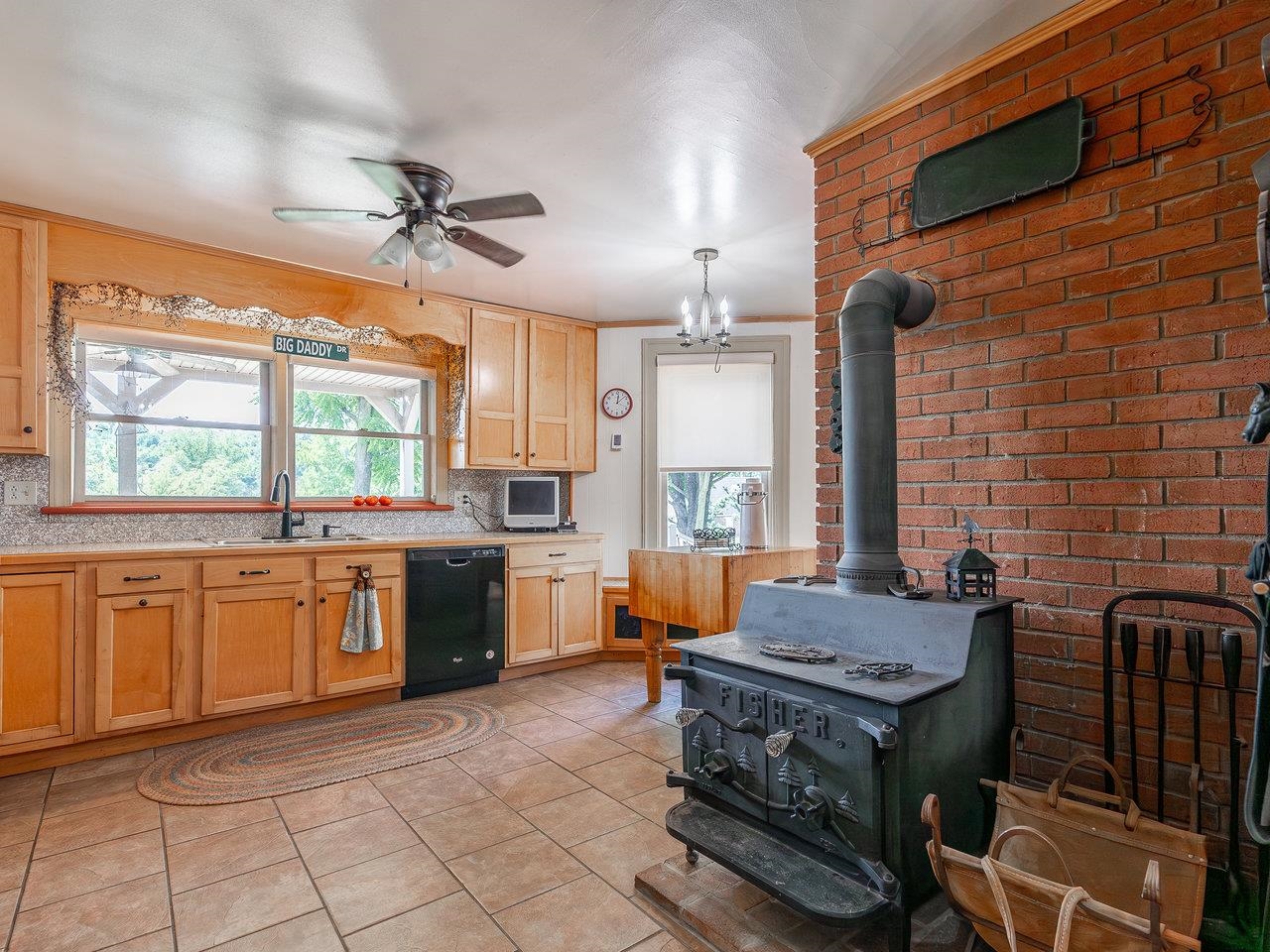 1299 North River Road Mount Crawford, VA 22841 - Photo 16 of 75 a kitchen with sink cabinets and window
