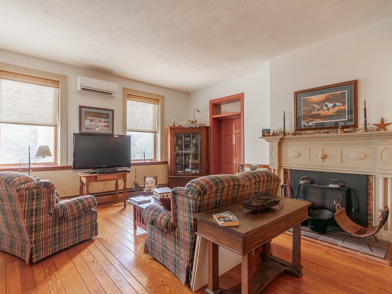1299 North River Road Mount Crawford, VA 22841 - Photo 31 of 75 a living room with furniture a flat screen tv and a fireplace