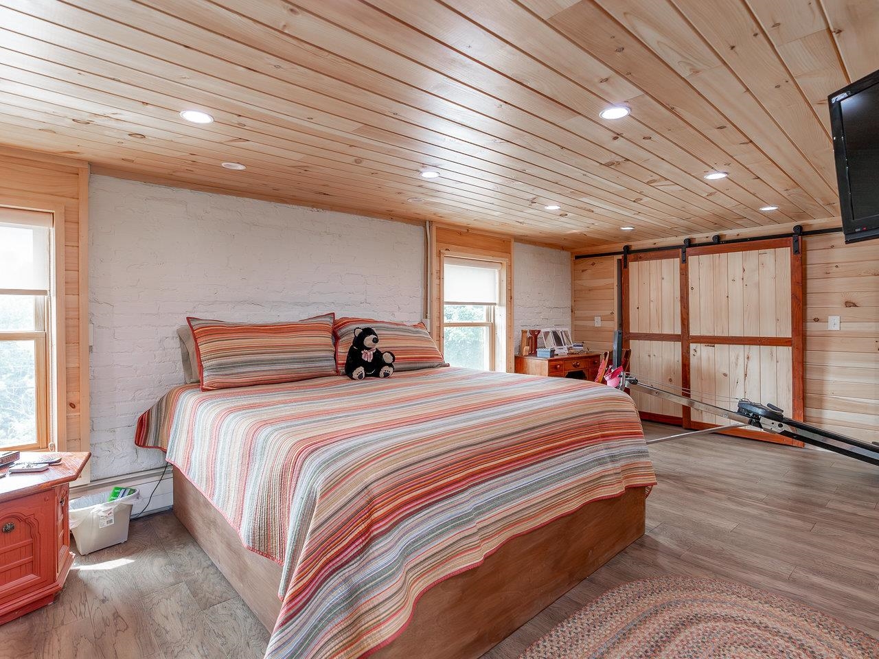 1299 North River Road Mount Crawford, VA 22841 - Photo 37 of 75 a bedroom with bed and wooden floor