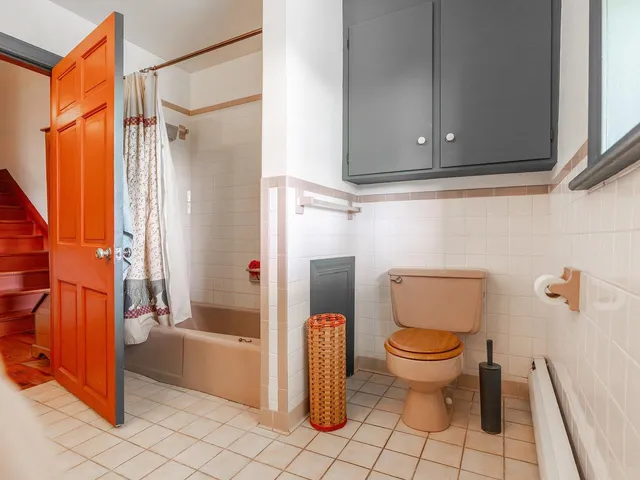 a view of a balcony with wooden floor