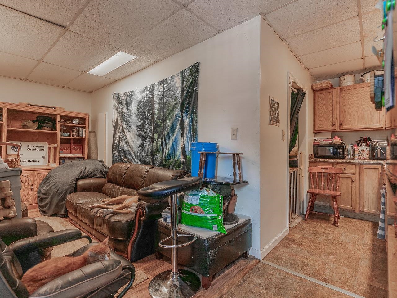 1299 North River Road Mount Crawford, VA 22841 - Photo 60 of 75 a living room with furniture and a book shelf