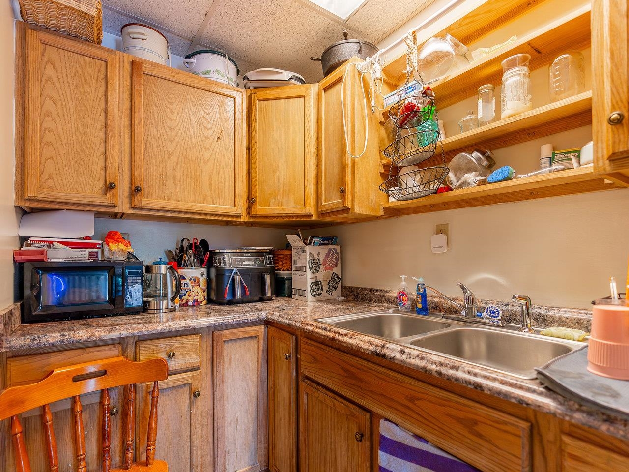 1299 North River Road Mount Crawford, VA 22841 - Photo 61 of 75 a kitchen with stainless steel appliances granite countertop a sink and cabinets