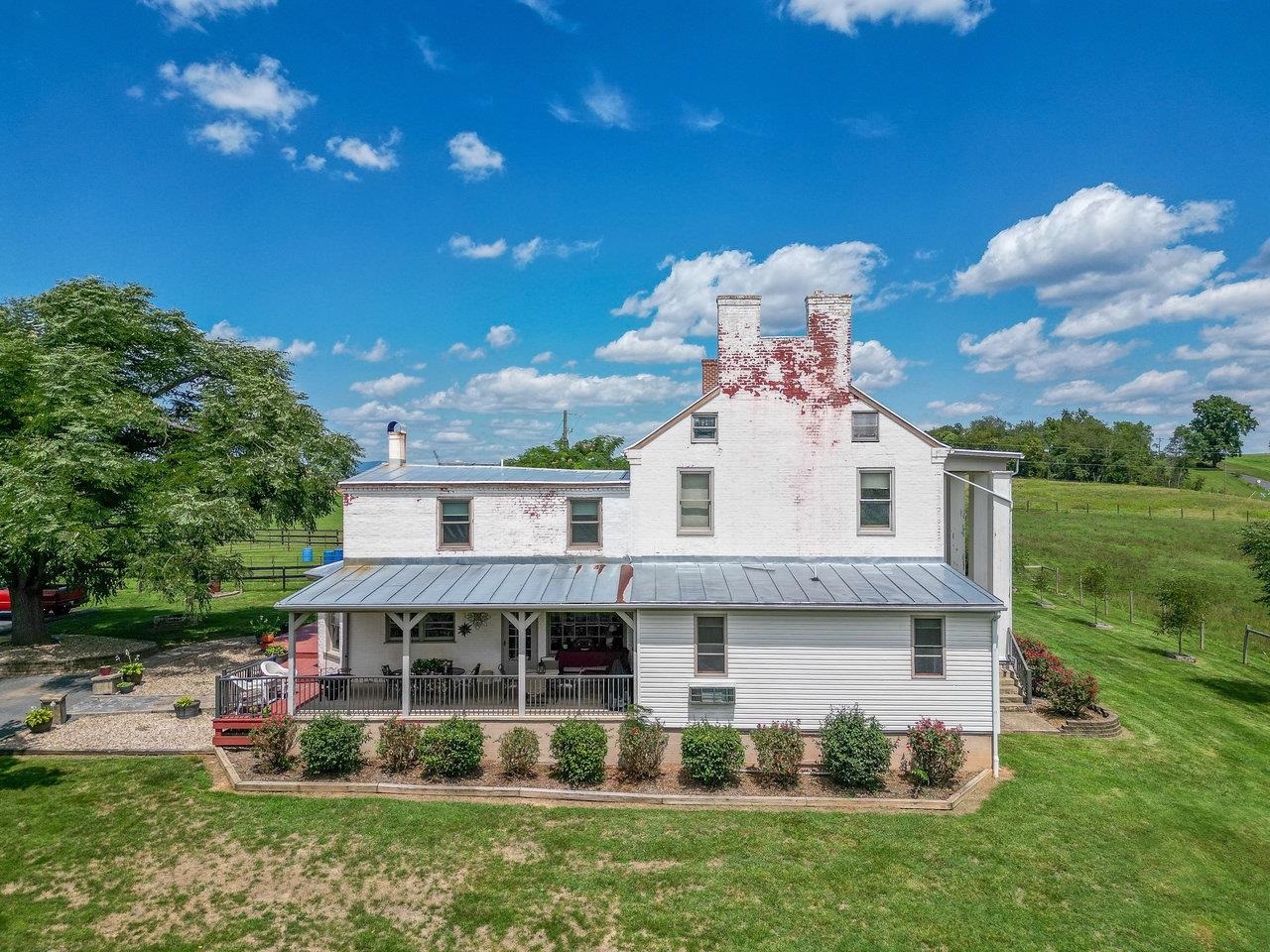 1299 North River Road Mount Crawford, VA 22841 - Photo 74 of 75 a view of a house with a yard and potted plants