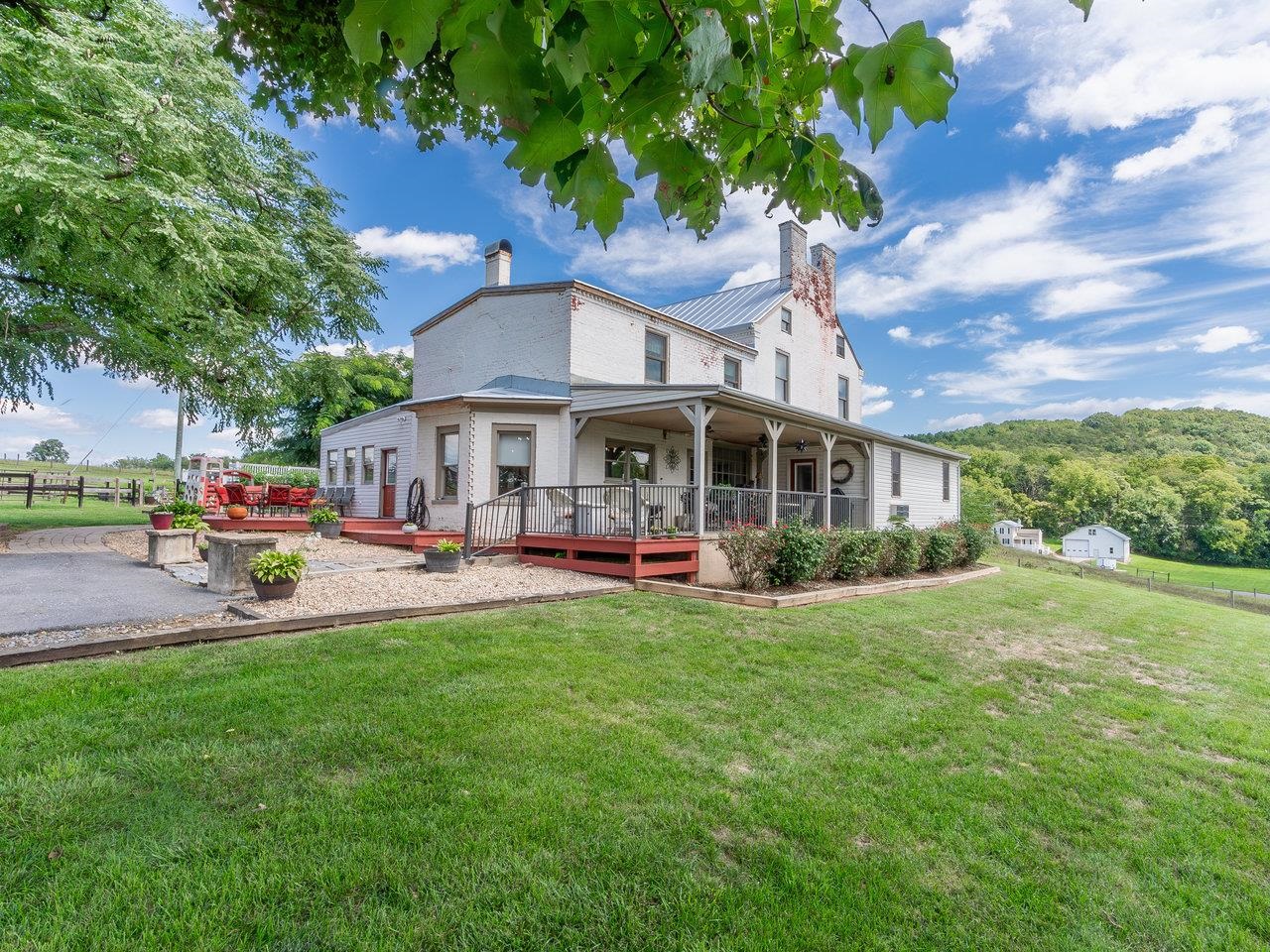 1299 North River Road Mount Crawford, VA 22841 - Photo 9 of 75 a view of a house with a yard porch and sitting area