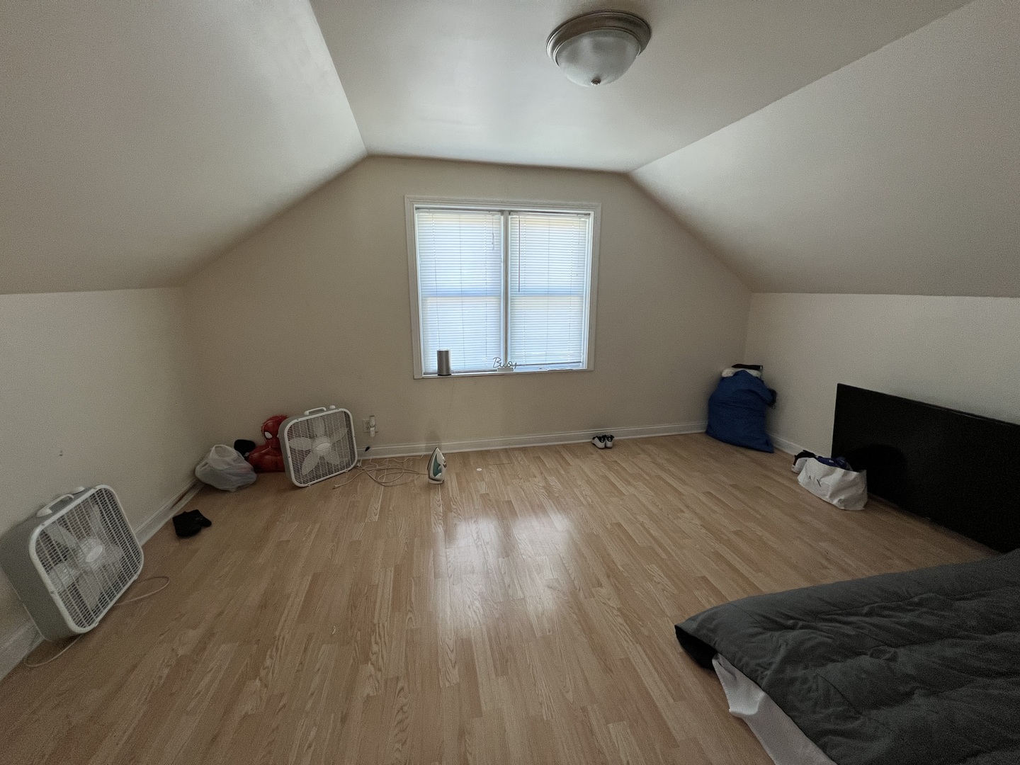 7501 West 58th Street Summit, IL 60501 - Photo 6 of 8 a bedroom with bed and wooden floor