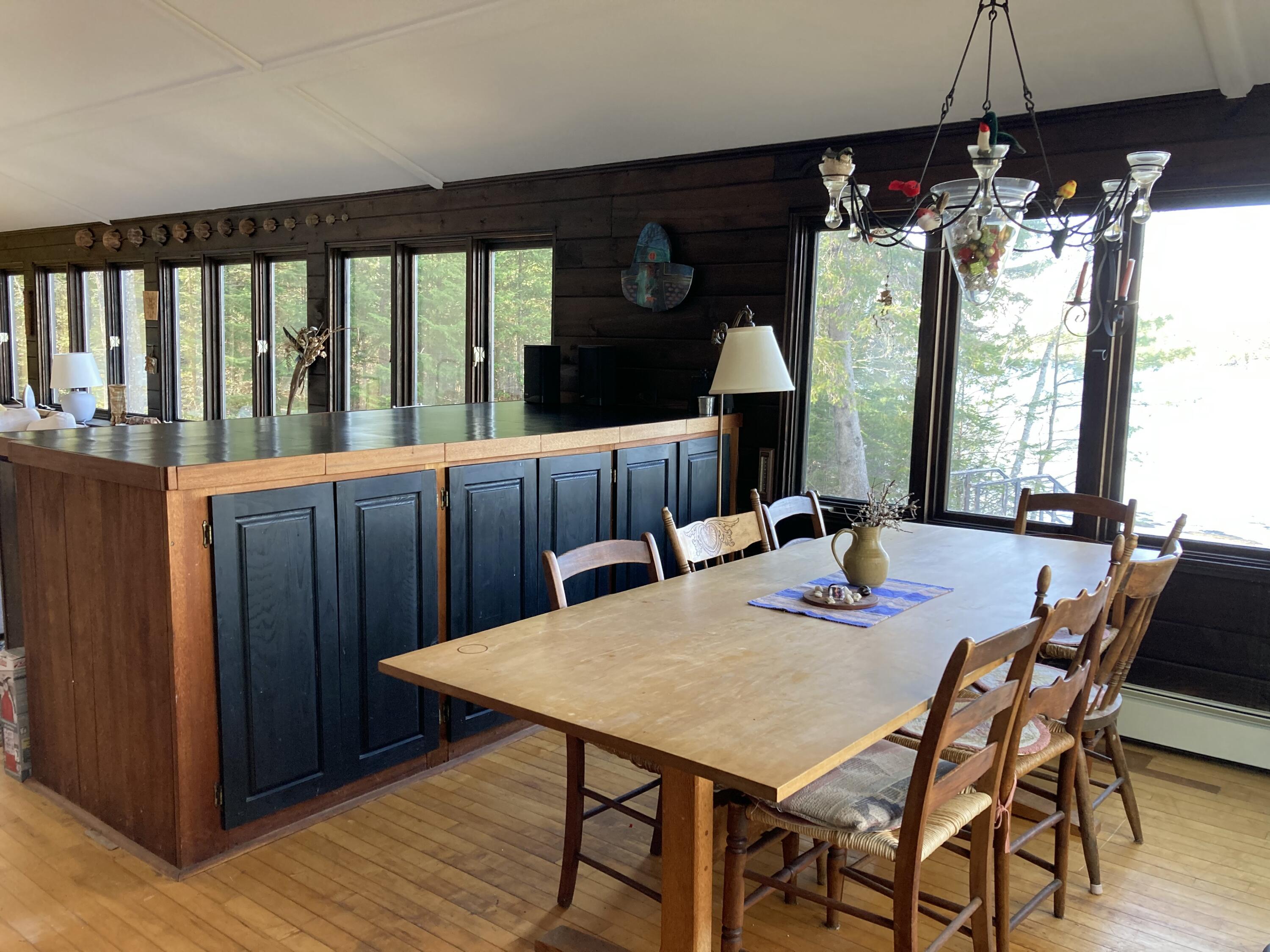 32 Taunton Keep Hancock, ME 04640 - Photo 11 of 25 Dining room w/storage devider.