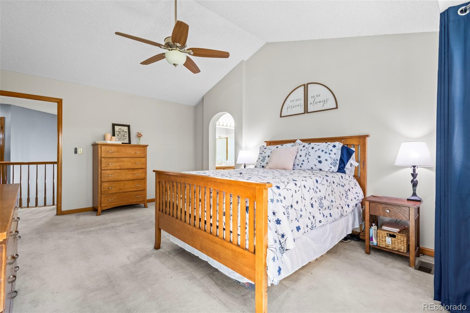 17538 East Baker Place Aurora, CO 80013 - Photo 23 of 50 a bedroom with a bed next to a window with a ceiling fan