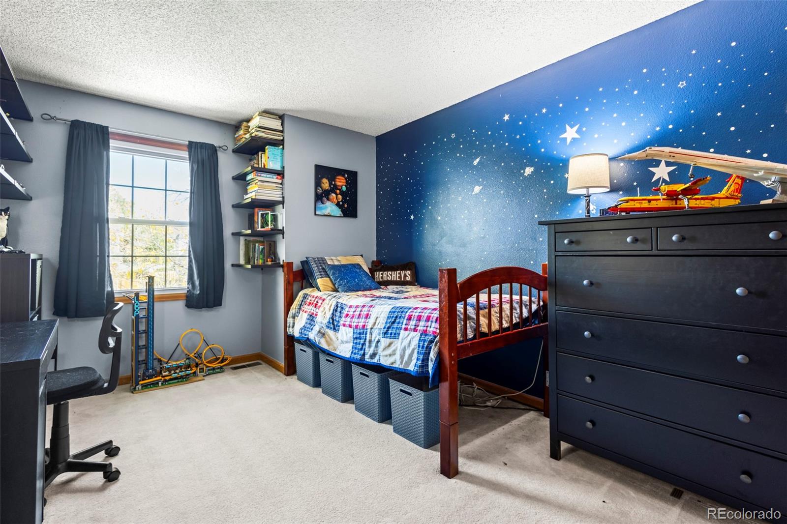 17538 East Baker Place Aurora, CO 80013 - Photo 30 of 50 a bedroom with furniture and a window