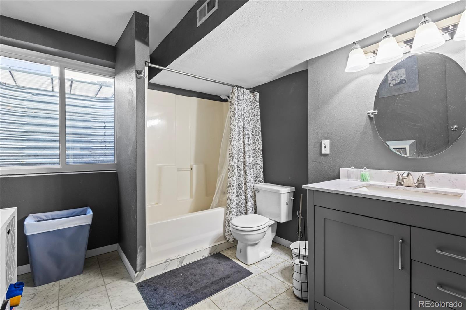 17538 East Baker Place Aurora, CO 80013 - Photo 40 of 50 a bathroom with a sink toilet and shower