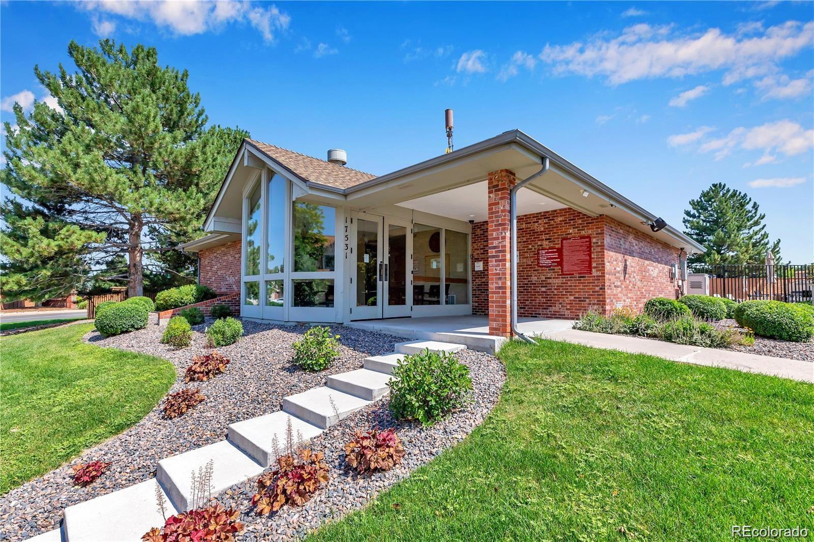 17538 East Baker Place Aurora, CO 80013 - Photo 46 of 50 a view of a house with a backyard