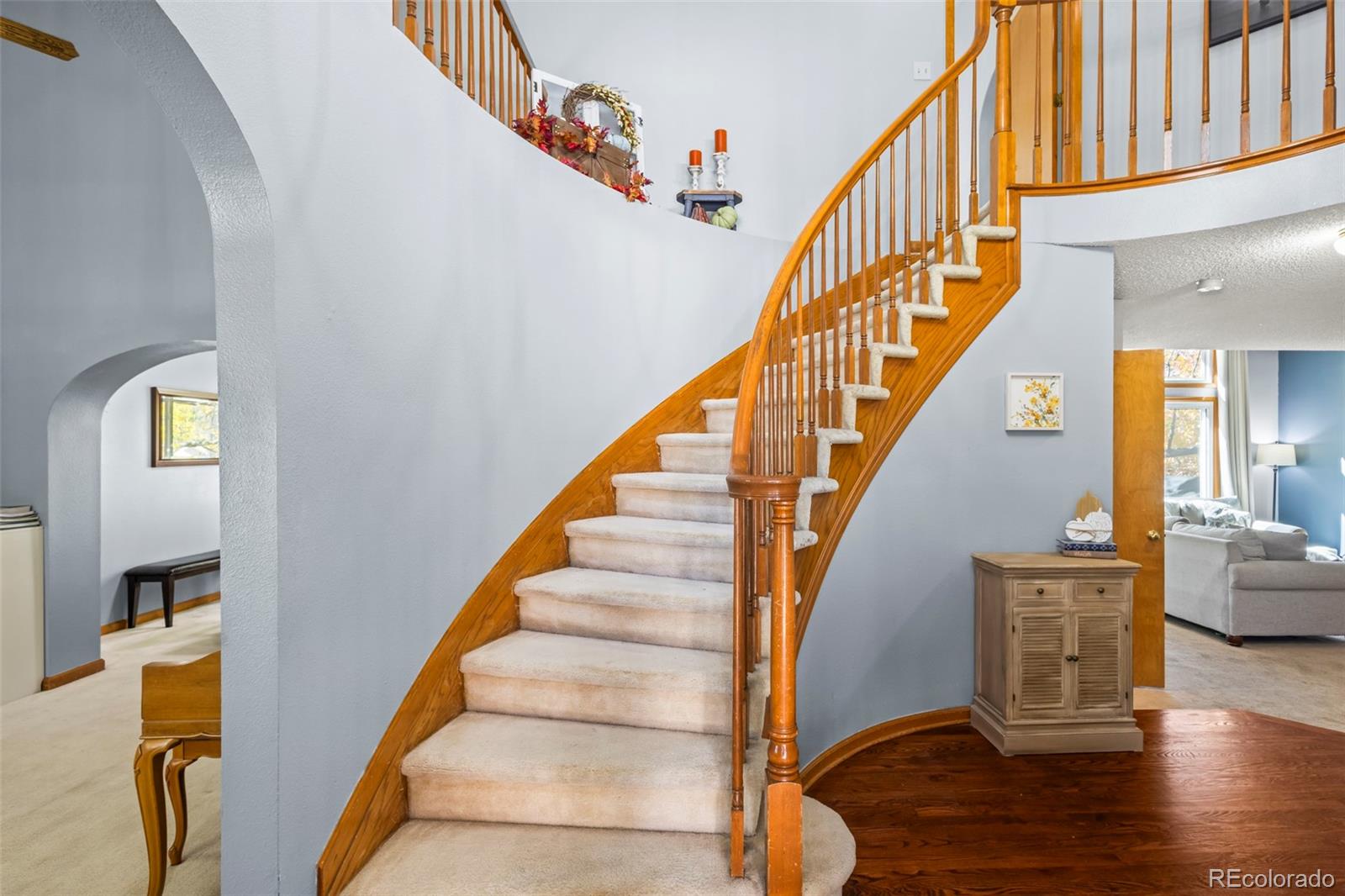 17538 East Baker Place Aurora, CO 80013 - Photo 5 of 50 a view of entryway and hall with wooden floor