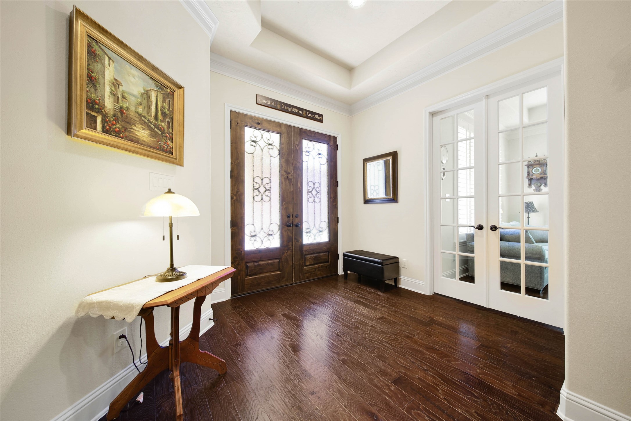 3234 Explorer Way Conroe, TX 77301 - Photo 9 of 46 Step inside to rich hardwood floors, detailed millwork, and an impressive welcoming foyer.