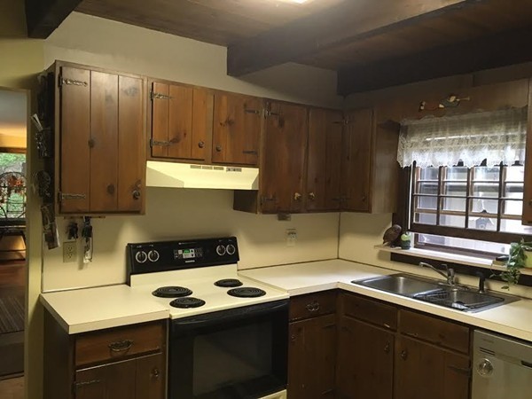 76 Proctor Road Townsend, MA 01469 - Photo 8 of 30 a kitchen with a sink and cabinets