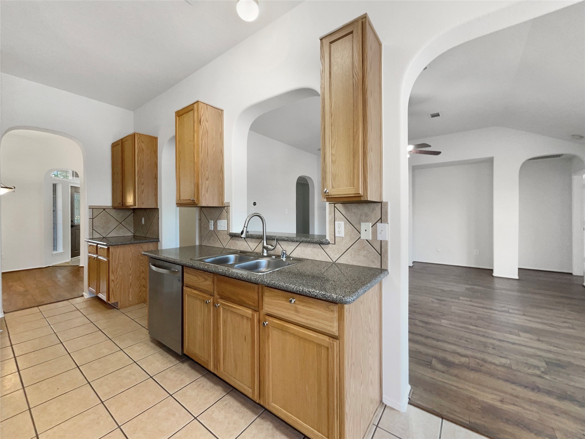 18810 Appletree Ridge Road Houston, TX 77084 - Photo 14 of 24 a bathroom with a granite countertop sink and a mirror